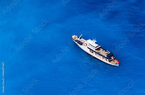 Fototapeta Aerial view at the cruise ship at the day time. Adventure and travel.  Landscape with cruise liner in Greece. Luxury cruise. Travel and vacation image. Aerial seascape.