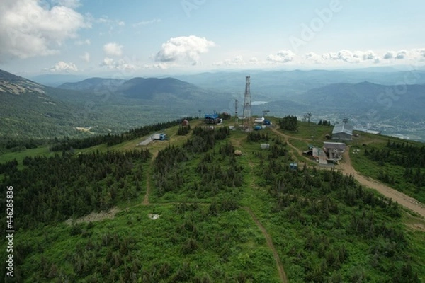 Obraz the top of the ski resort under construction in summer. Panoramic view in the summer sunset to the ski resort. Sheregesh
