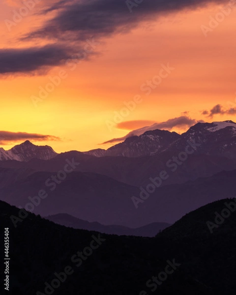 Fototapeta an incredible colorful sunrise from the mountains with snow