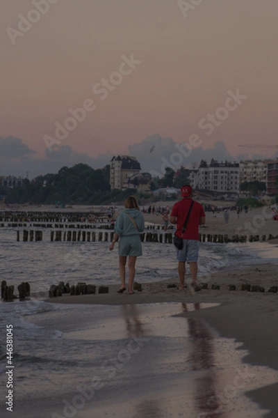 Fototapeta walking on the beach