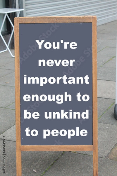 Fototapeta You're never important enough to be unkind to people on a chalkboard outside

