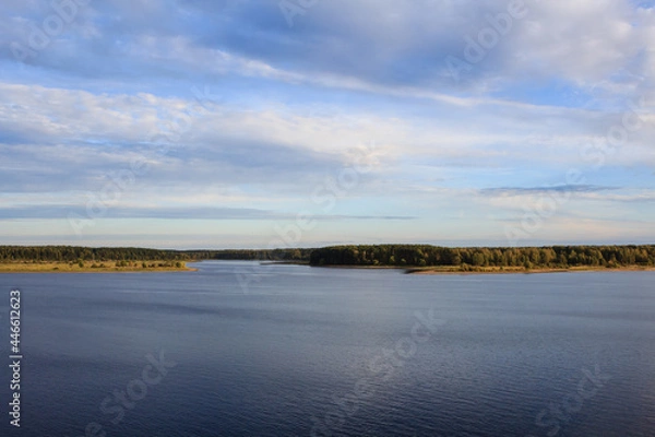 Fototapeta landscape view of the river Volga valley with fields and forest under the cloudy sky