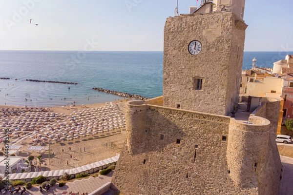 Fototapeta Panoramic aerial view of the beach and the ancient Castello Svevo fortress during a summer day , in the ancient town of Termoli , Molise , Italy