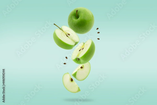 Fototapeta Stack of green Apple falling or flying.Creative levitation food