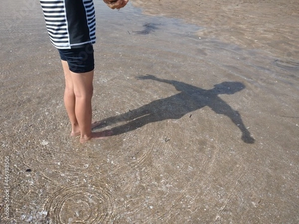 Obraz person walking on beach