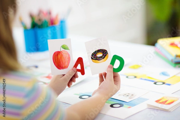 Fototapeta Kid learning to read. Phonics flash cards.