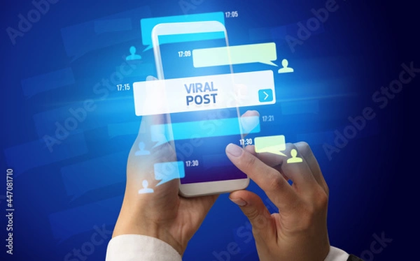 Obraz Hand using smartphone with social media concept