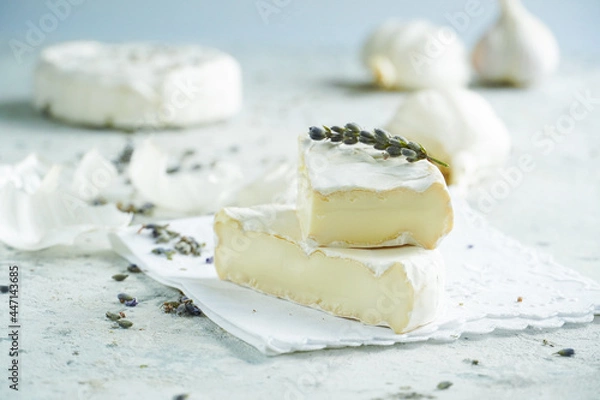Obraz Camembert cheese on a background of garlic and lavender