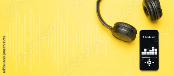 Fototapeta Podcast icon. Audio equipment with microphone, sound headphones, podcast application on mobile smartphone screen. Radio recording sound voice on yellow background. Broadcast media music concept.