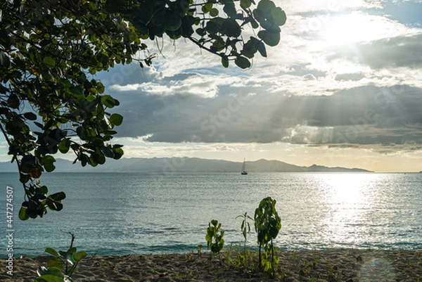 Fototapeta lake in front of the mountains at sunset