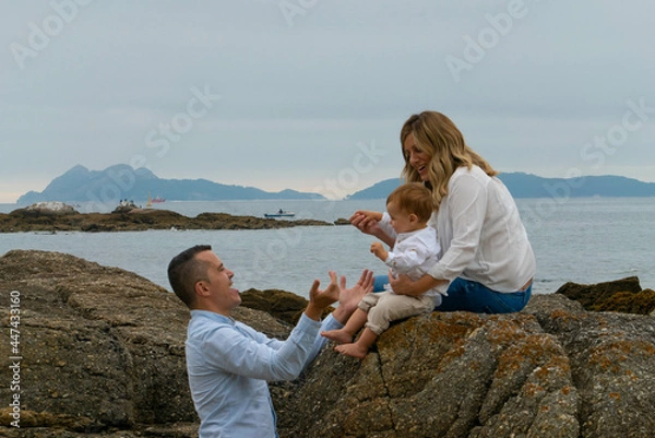 Fototapeta Happy family and child on beach