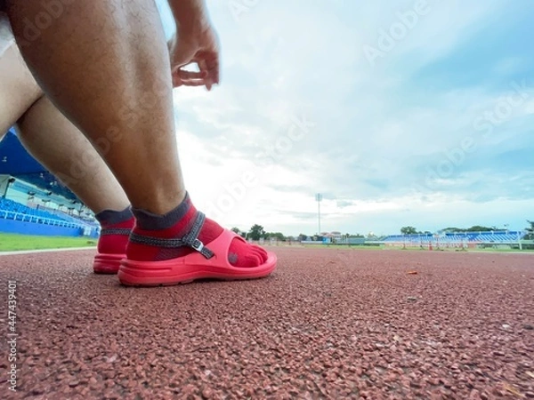 Obraz Exercise, even with sandals, can come to exercise by running.