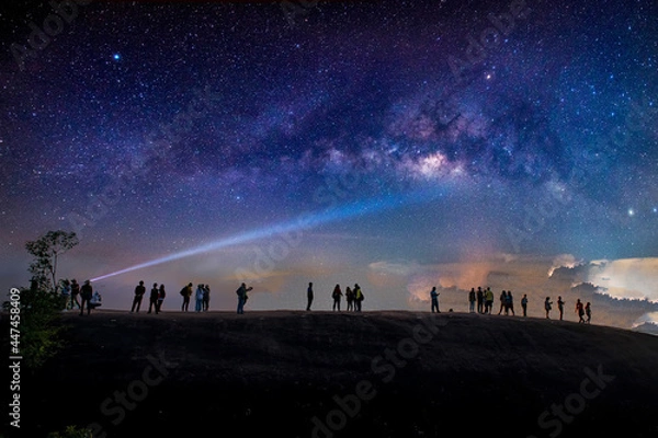 Fototapeta Milky Way galaxy, on the mountains. Long exposure photograph, with grain.Image contain certain grain or noise and soft focus.