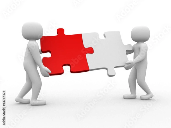 Obraz Two person matching puzzle pieces