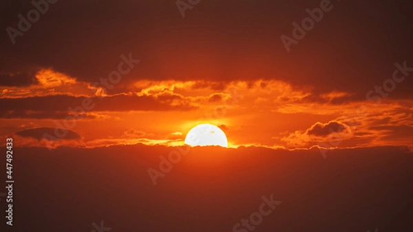 Obraz Beautiful sunset behind dark clouds