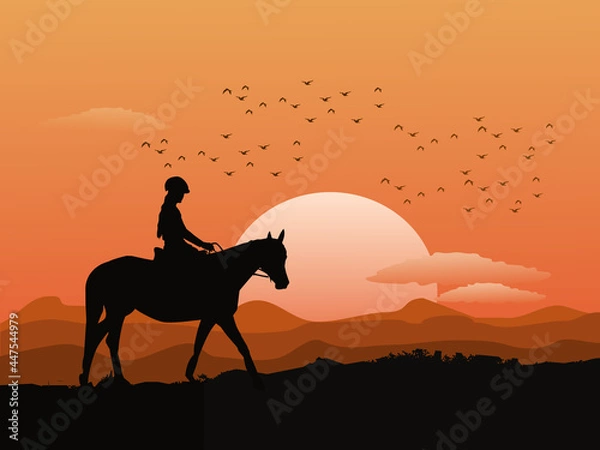 Obraz Silhouette of a woman riding a horse on top of a mountain with sunset in the background.
