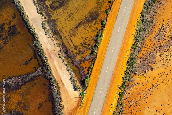 Obraz Hutt Lagoon contains the world's largest microalgae production. These artificial salt ponds are used to farm Dunaliella salina, which is a source of beta-carotene; a food-coloring agent, and pigment.