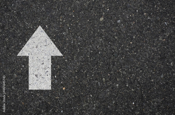 Fototapeta Asphalt with a up arrow sign. Tarmac road with right arrow sign