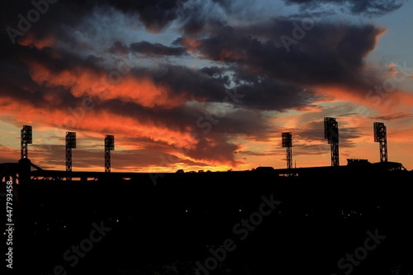 Obraz sunset against a baseball park
