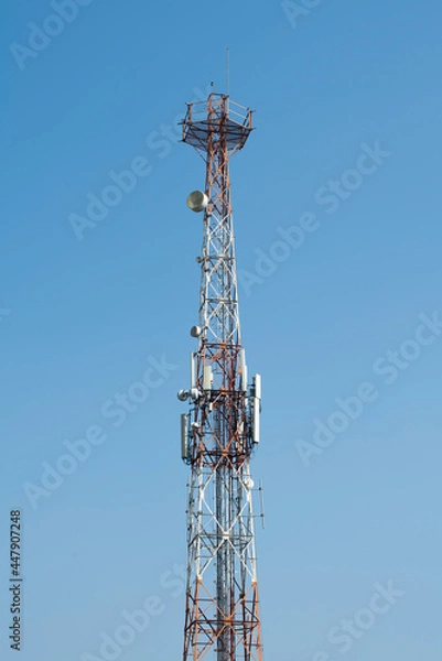 Obraz Communications tower with blue Cloud sky background