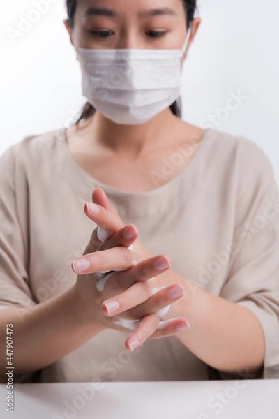 Obraz Hand washing on white background medical procedure concept