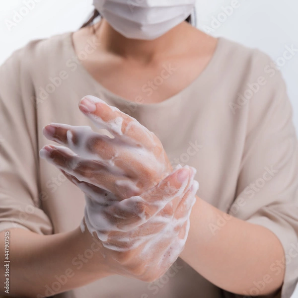 Obraz Hand washing on white background medical procedure concept