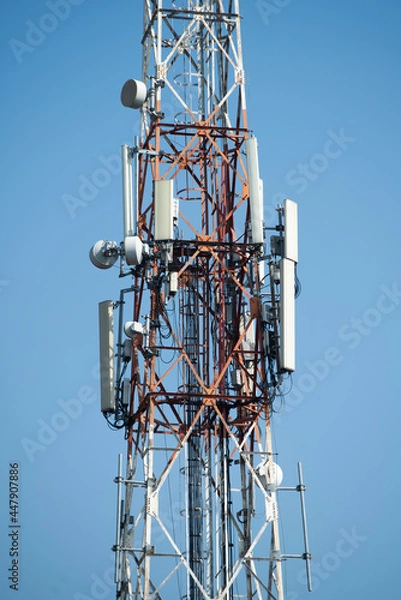 Obraz Communications tower with blue Cloud sky background