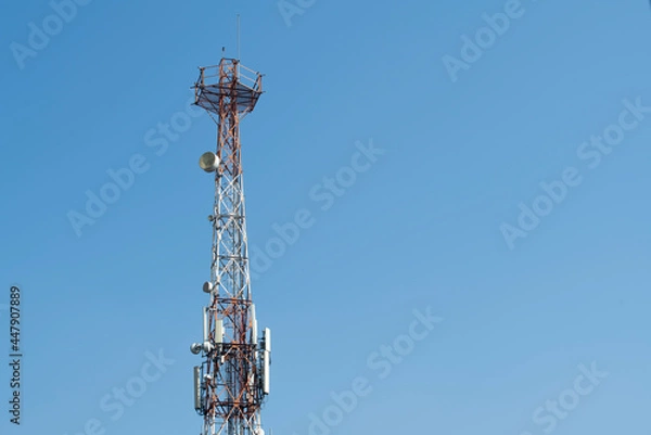Obraz Communications tower with blue Cloud sky background