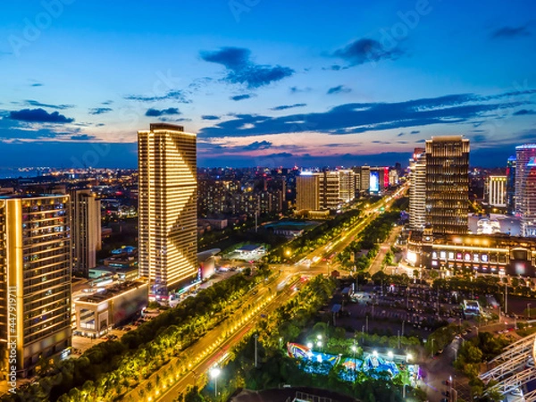 Fototapeta Aerial photography of the night view of Nantong Financial Center, Jiangsu
