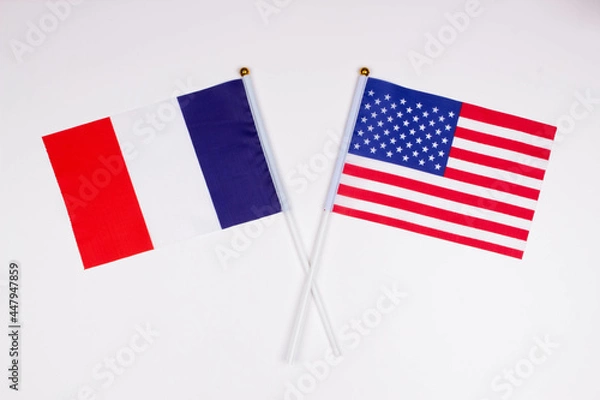 Fototapeta Flag of France and flag of * crossed with each other on a white background. Isolated. The image illustrates the relationship between countries. Photo for news and articles on the media