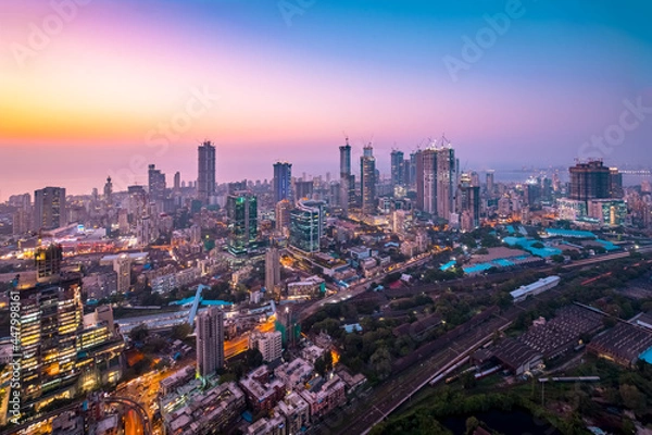 Obraz Colourful hues of the sky over the cityscape of Mumbai at dusk, as seen from Currey Road.