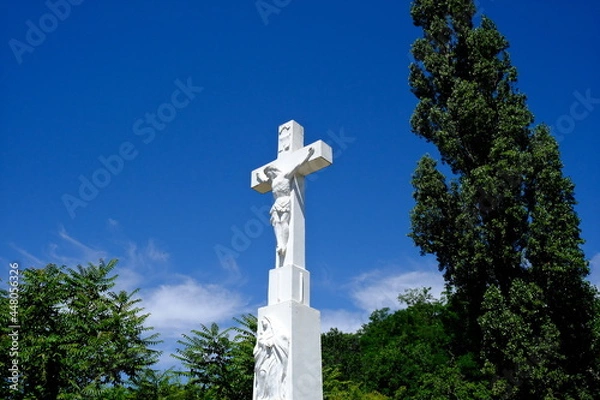 Fototapeta Statue of Christ on cross with Mary