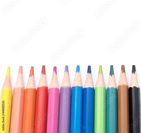 Fototapeta Colored pencils on a white background.