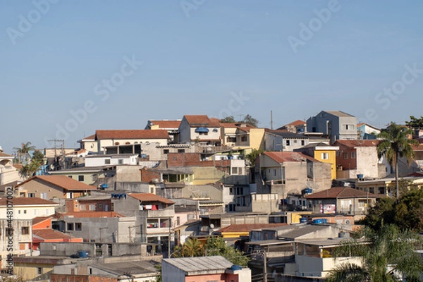 Fototapeta houses on the outskirts of São Paulo with blue sky.