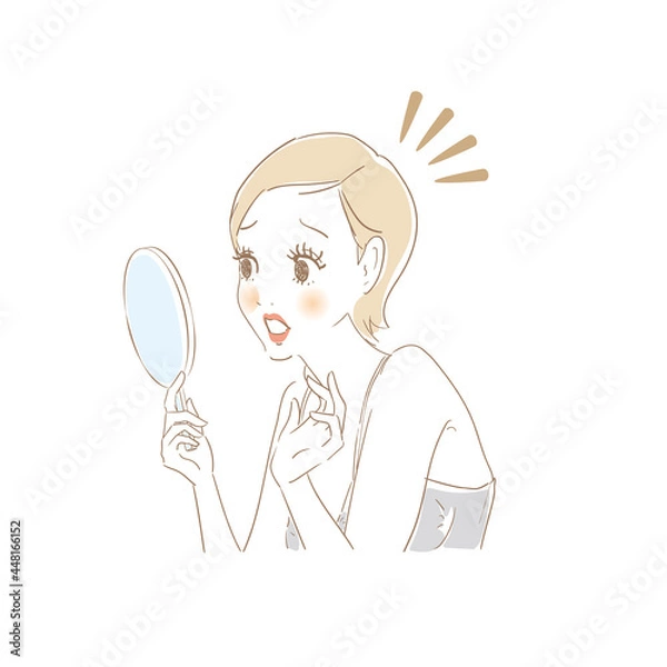 Fototapeta 鏡でお肌をチェックする女性