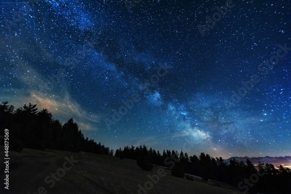Fototapeta Night photos in the High Tatras Mountains with a bright starry sky and the Milky Way	
