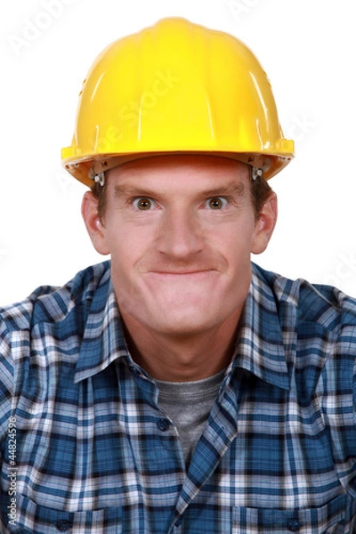 Fototapeta Tradesman making a silly face