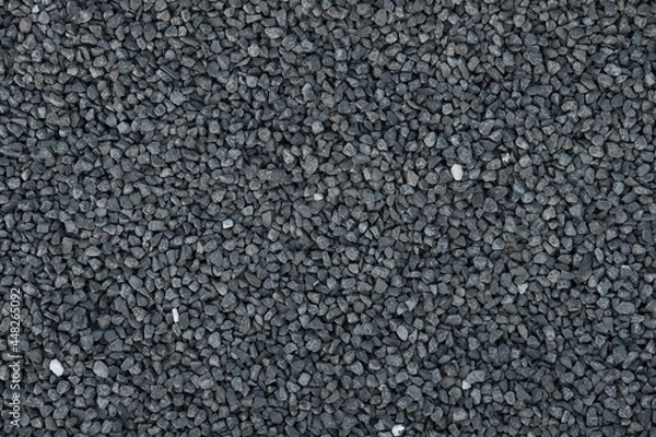 Fototapeta Close-up of crushed stone, granite gravel. Rough geometric seamless pattern and background of building material.
