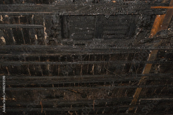 Fototapeta Burnt ceiling in an old building. House after the fire.