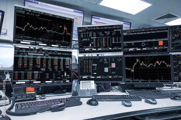 Fototapeta group of stock data monitor analyzing data stock market in monitoring room on the data presented in the chart, forex trading graph, stock exchange trading online, financial investment