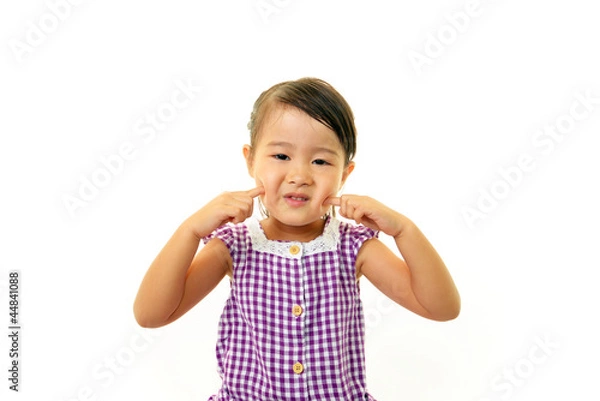 Fototapeta はにかむ笑顔の女の子