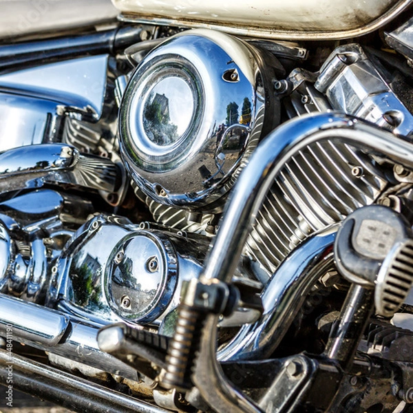 Fototapeta Motorcycle engine closeup. chrome engine parts. Shiny smooth details.