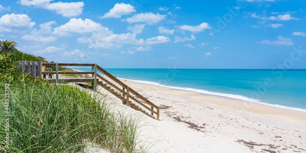 Obraz Wooden Boardwalk and Staircase Leading to Atlantic Ocean Beach Side View, Melbourne Beach, Florida, USA