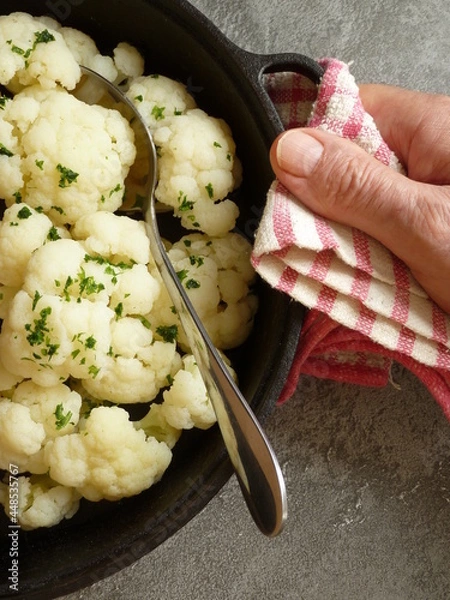 Obraz Cooked cauliflower ready to eat served in a cast iron skillet