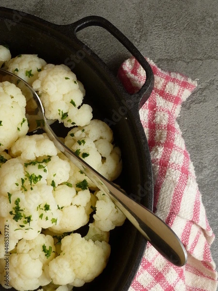 Obraz Cooked cauliflower ready to eat served in a cast iron skillet