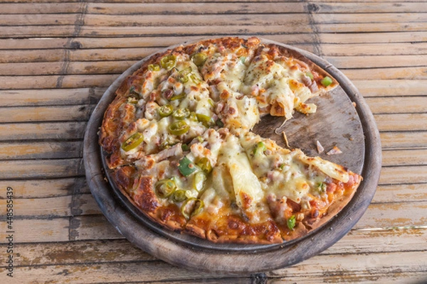 Obraz Pizza on wooden tray.