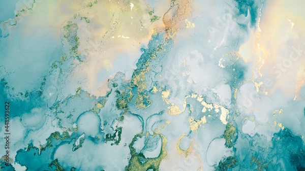 Obraz Luxury abstract fluid art painting in alcohol ink technique, mixture of blue, yellow and gold paints. Imitation of marble stone cut, glowing golden veins. Tender and dreamy design.