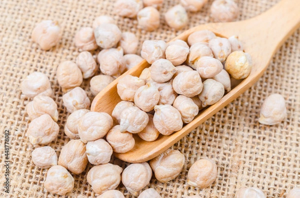 Fototapeta The uncooked chickpeas.