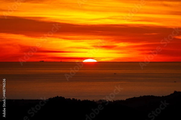 Obraz sunset over the ocean