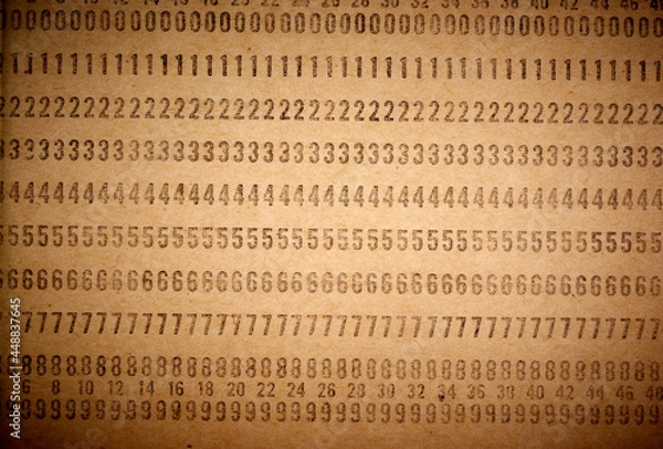 Fototapeta Closeup of perforated punched card, obsolete data storage. Vintage unused computer punch cards used for programming and data entry in the sixties and seventies